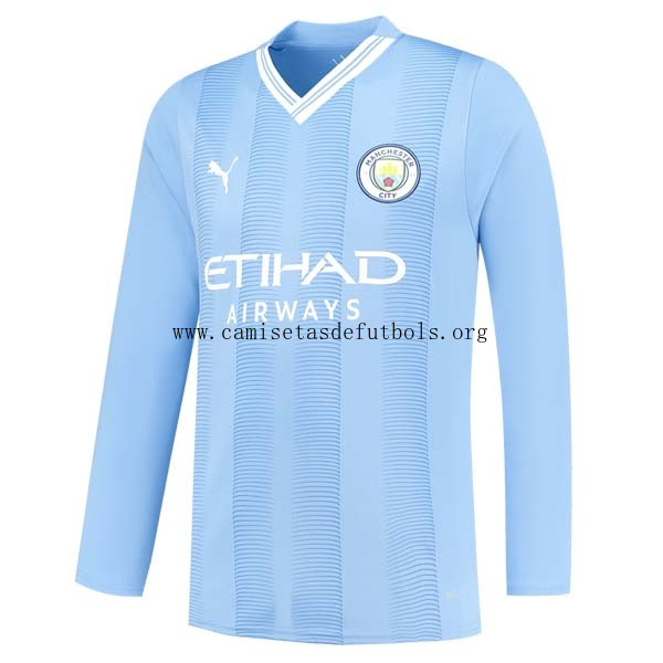 Camiseta Manchester City Replica Primera Ropa ML 2023/24 Reserva este gangaza increíble